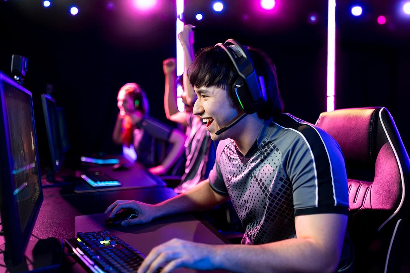 man gaming on a pc